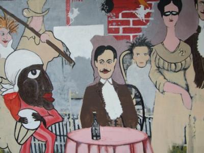 Esperando la cena, un artista con pincel y alma pinta una pared de Buenos Aires...